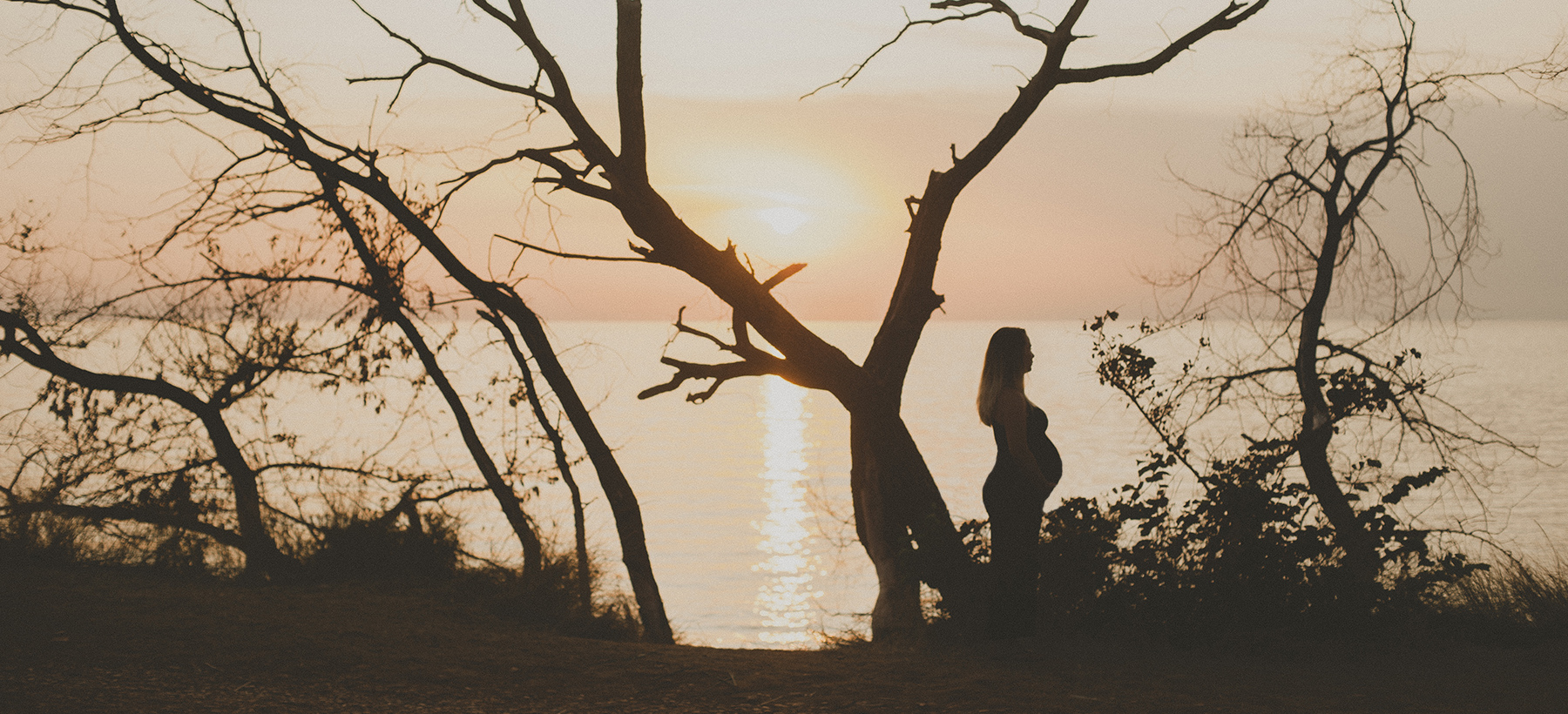 Photographing a pregnant woman.